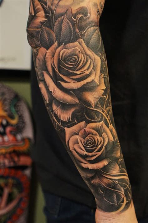 Tattoos like this are stylish and feminine. Image result for roses sleeve | Rose tattoos for men ...