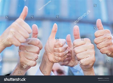 Cheering Business People Holding Many Thumbs Thumbs Up Stock Photo