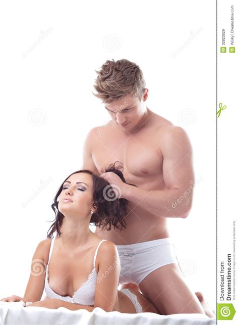 Passionate Attractive Couple Posing In Bed Royalty Free