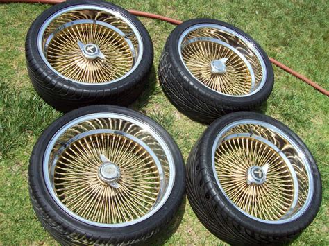 Bring some toys for the toy drive. 24 Inch Gold Dayton Wire Wheels - The Gold Picture