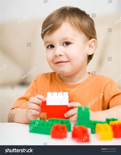 Cute Little Boy Playing Building Blocks Stock Photo 133764065