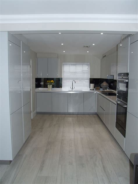 A Beautifully Bright And Modern Handleless Kitchen In High Gloss Light