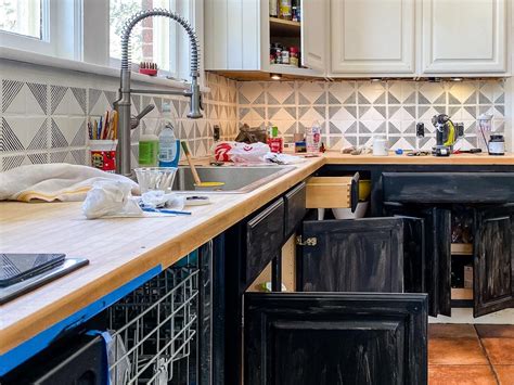 You'll want to prep all of the doors and drawers properly to ensure your paint will stick. How to Paint Kitchen Cabinets the Easy Way (2 days, no packing) | Kaleidoscope Living