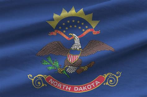 Premium Photo North Dakota Us State Flag With Big Folds Waving Close