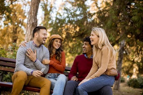 Group Of Young Multiethnic Friends Having Fun At Park Stock Photo