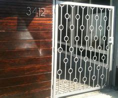 Really make an entrance, find your perfect driveway gate today. Modern gate, Modern landscape design, Modern landscaping
