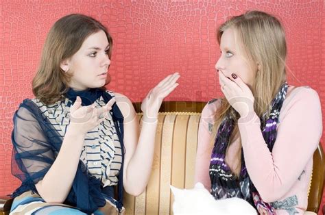 Now he must fight agai. Two women in living room chatting | Stock Photo | Colourbox