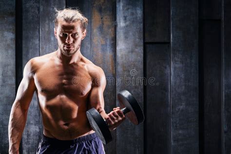 Athletic Man Making Lifting Exercises With Dumbbells For Bigger Biceps Stock Image Image Of