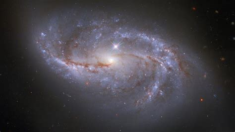 Meet ngc 2608, a barred spiral galaxy about 93 million light years away, in the constellation cancer. Windows LockScreen