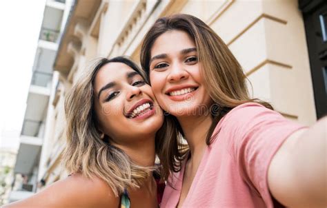 Two Friends Taking A Selfie Outdoors Stock Image Image Of Selfie Happiness 214160787