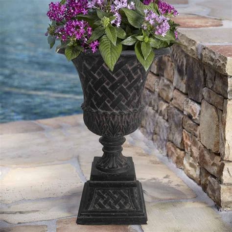 MPG 16.25 in. x 26.5 in. Cast Stone Lattice Urn and Pedestal in Aged