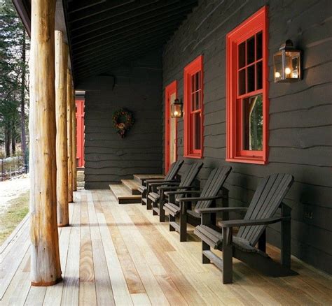 Black paint highlights window sashes and dentil moldings running across window and door trim. Black paint on exterior, red trim I LOVE this. There's a ...