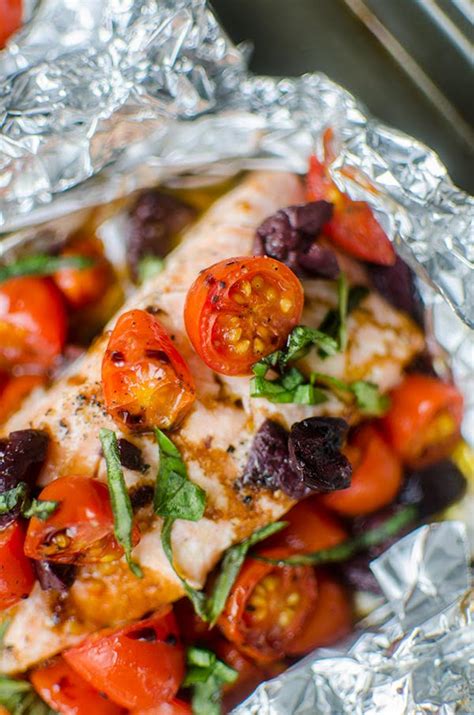 How that happens is that, after seasoning your salmon, you seal it up in a foil pouch. Grilled Salmon in Foil with Cherry Tomatoes — Living Lou