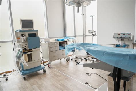 Interior Of Operation Room With Different Medical Equipment Ready For