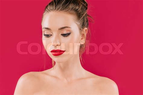 Naked Beautiful Woman With Red Lips Looking Away Isolated On Red