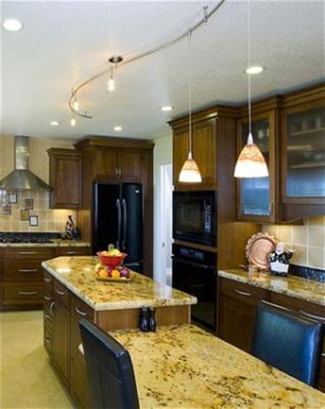 Gooseneck track lights such as these in claes and melinda's home tour, look ultra modern and minimalist but provide ample kitchen lighting. Stylish Kitchen Lighting Ideas: Track Lighting - Interior ...