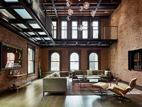 Room Living Area With Lots Of Exposed Brick Sits Beneath A Metal