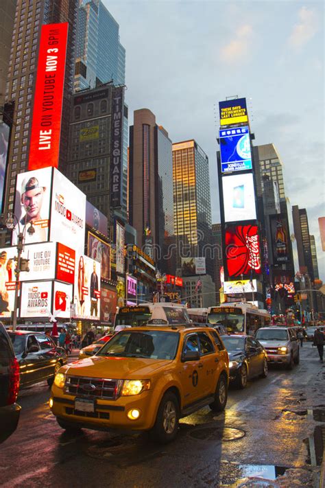 Times Square With Animated Led Signs And Yellow Cabs