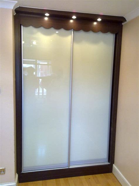 Custom, made to measure fitted wardrobes and doors. Fitted Wardrobes | Sliding Wardrobes