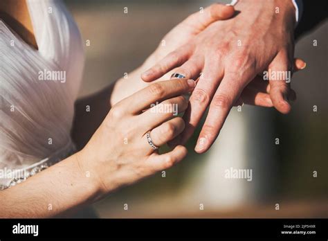 Bride And Groom Exchange Rings At The Wedding Ceremony Stock Photo Alamy