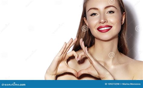 Romantic Young Woman Making Heart Shape With Her Fingers Love And Valentines Day Symbol Stock
