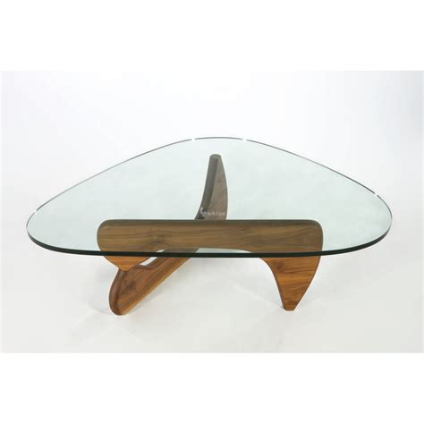 The smaller table is on casters allowing it to go ahead. 10 Photos Living Room Glass Coffee Tables for Small Spaces