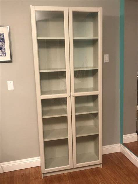 Billy bookcase with glass doors, dark blue, 31 1/2x11 3/4x79 1/2. Ikea Bookcase with Glass Doors | Bookcase with glass doors ...
