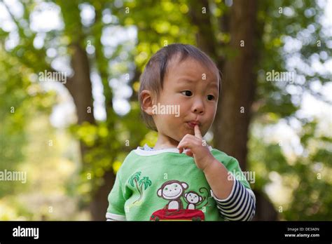 Asian Baby Boy Sucking Finger Stock Photo Alamy
