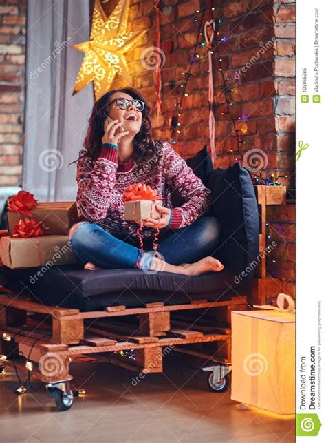 Brunette Female In A Room With Christmas Decoration Stock Image Image Of Furniture Sofa