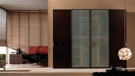 It is usually tall with upright case fitted with hooks and shelves. Wardrobe Designs