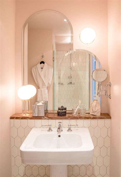 I think you just have to roll with the fact that it's pink and perhaps do a soft pink around it for the walls, towels, accents. PNC Real Estate Newsfeed » Powder Room: 8 Favorite Pink ...