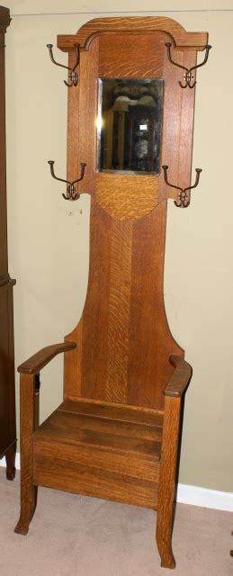 We have a wide variety of hall trees for sale with free shipping. Solid oak petite hall tree with iron hat racks and bench ...