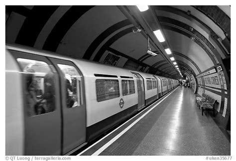 Walking the streets of london. Black and White Picture/Photo: Train in station, London ...