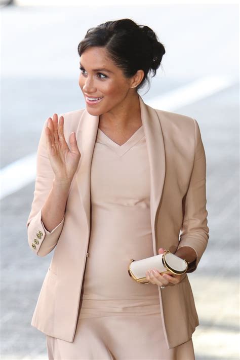 Personally, i find the cradling a bit like those signs in the back of cars: Ecksand 'Tresses' Gold Bar Earrings - Meghan's Mirror