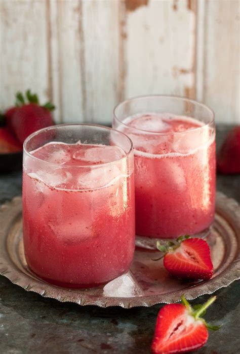 Coconut rum drinks give you a taste of the tropics all year around. A delectable cocktail with strawberries and coconut water | Recipe | Coconut water cocktail ...