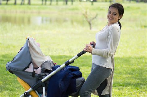 Young Mother On Walk Stock Photo Image Of Buggy Infant 60248124