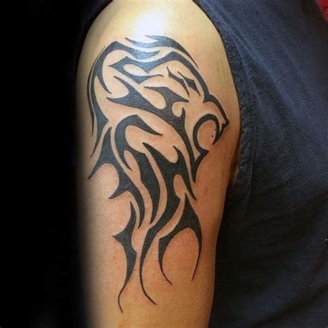 Prideful looking black tribal lion tattoo designs on shoulder for masculine guys. 40 Tribal Lion Tattoo Designs For Men - Mighty Feline Ink ...