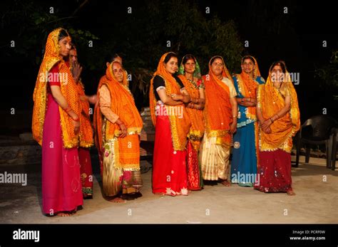 Group Of Indian Womans Wearing Colorful Saris Performing A Traditional Kumaoni Dance At Chotti