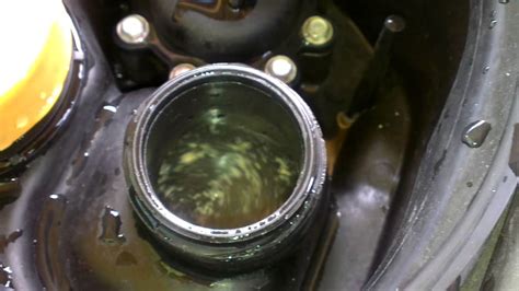 Keep your eye on the bag as the fluid flows, and when you've reached the recommended amount, stop the fluid by pulling back the little wheel tightly. Oil in coolant - YouTube