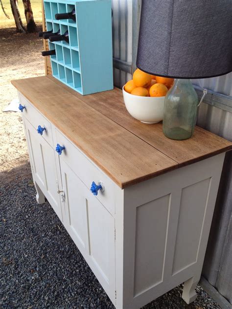 A luxurious sideboard in white fulfils the need for style and utility. Drip Designs Furniture: Antique white oak buffet/sideboard