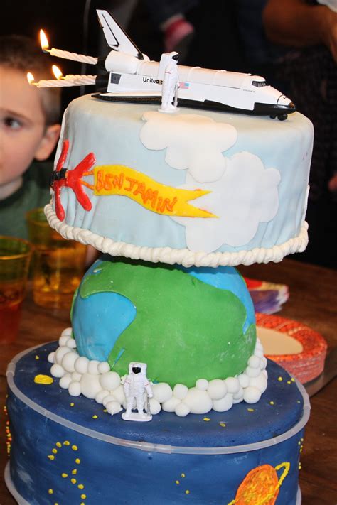 Celebrating the space shuttle launch on saturday! Space Shuttle Cake - far from great fondant work, but it ...