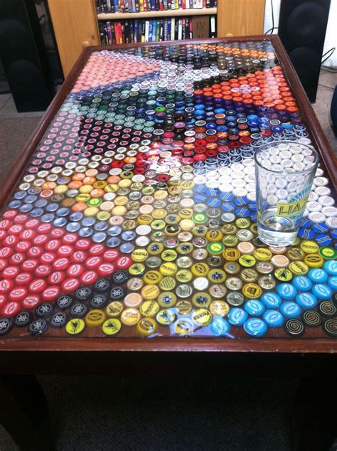As for ease of emptying, just lift it up off the two screws and. Bar top | Bottle cap table, Bottle cap crafts, Beer cap table