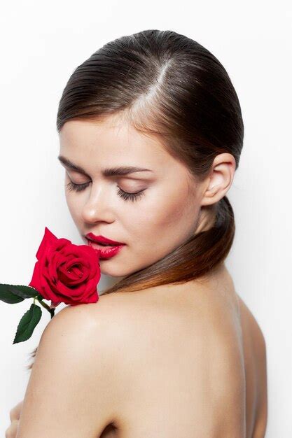 Premium Photo Woman With Rose Closed Eyes Flower Near Lips Makeup