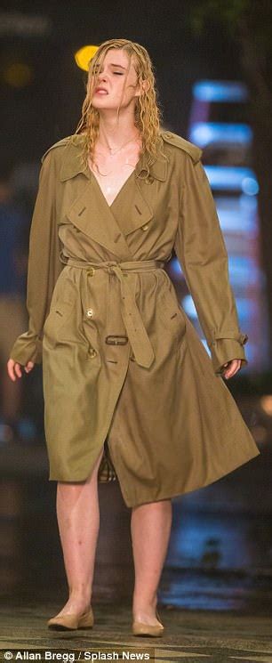Elle Fanning Flashes Her Underwear In Trench Coat Daily Mail Online
