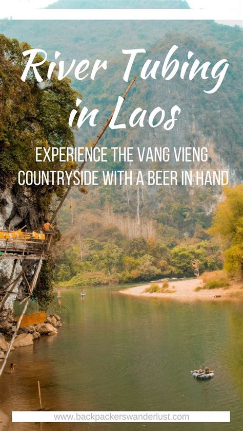 river tubing in laos experience the vang vieng countryside side with a beer in hand