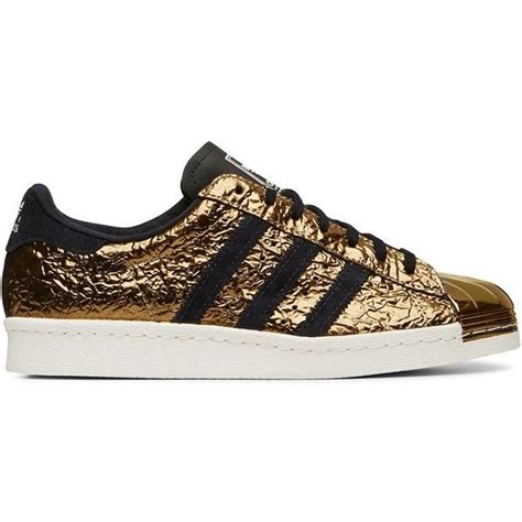 Womens black adidas trainers online shopping for women, men, kids fashion. Adidas Originals Black and Gold Superstar Low Top Sneaker ($180) liked on… | Adidas shoes ...