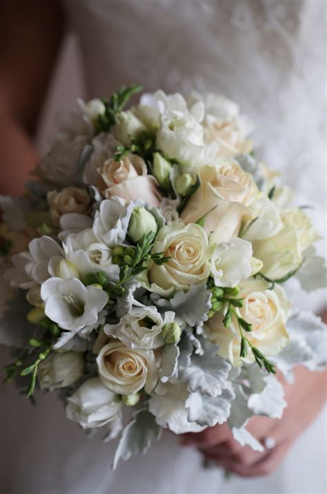 The unique horizontal blooms add incredible volume and texture to any bouquet, centerpiece or altar. Cream & white bridal bouquet using freesias, roses ...