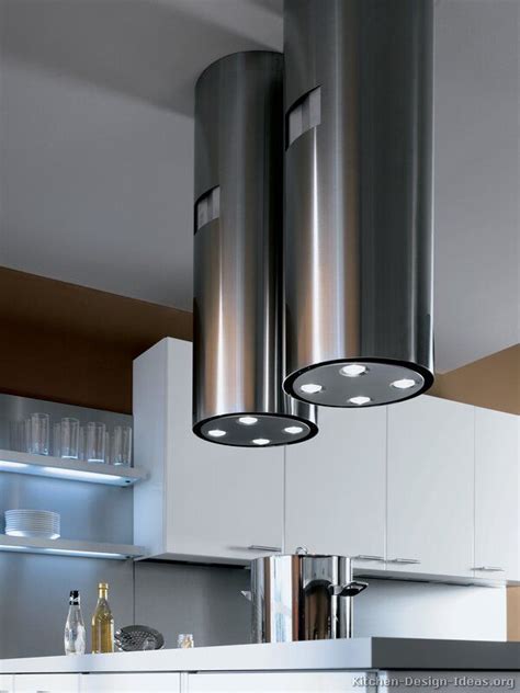 Cosmo kitchen presents this modern european style range hood. Modern dual chimney hoods each contain four lights ...