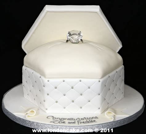 The cake was covered in white fondan. Some Cute Engagement Cakes / Engagement Cakes ideas