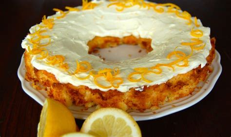 Add the eggs one at a time, beating in between. Lemon Coconut Cake with Cream Cheese & Yogurt Icing ...